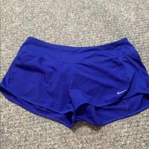 Purple Nike shorts